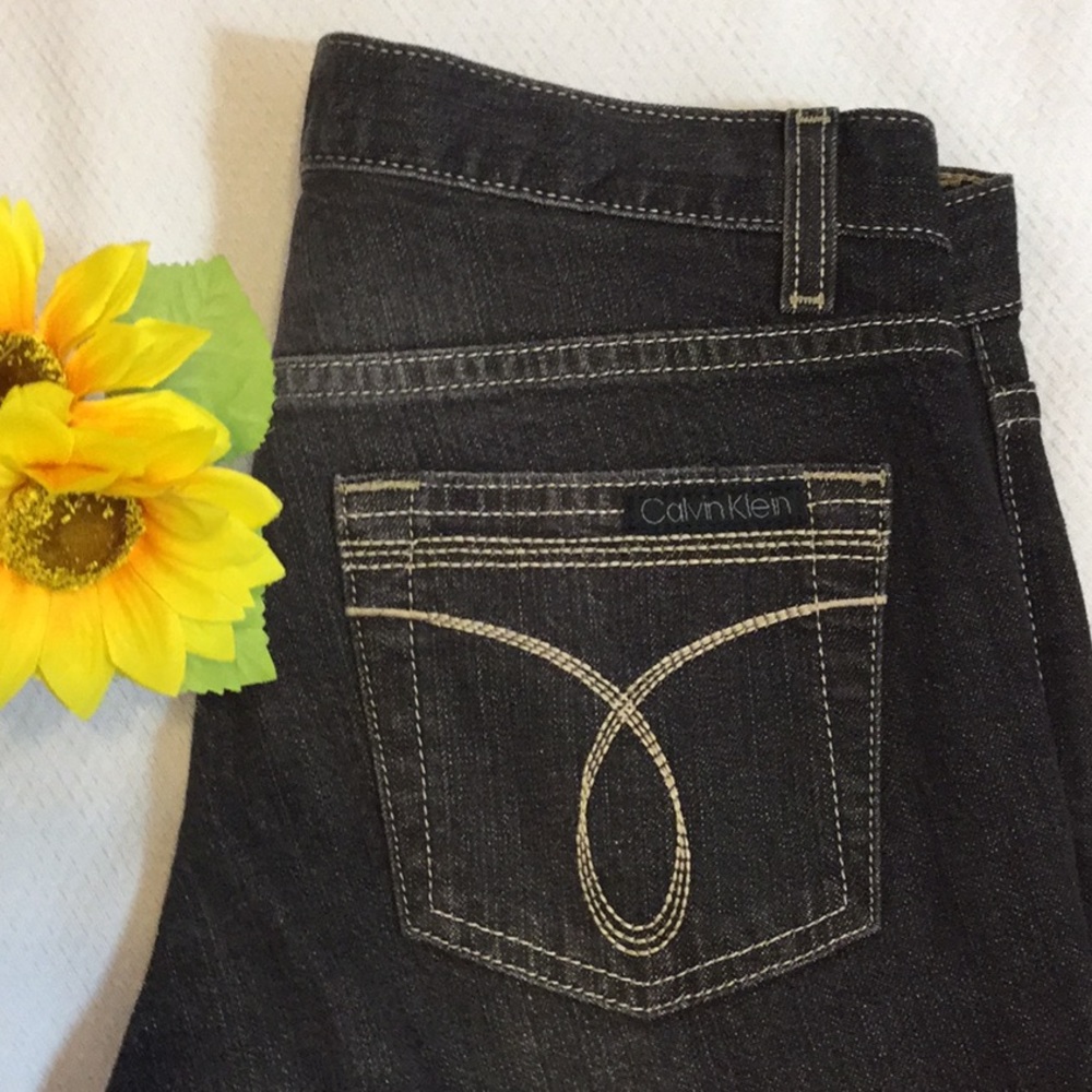 Calvin Klein dark wash flare size 4